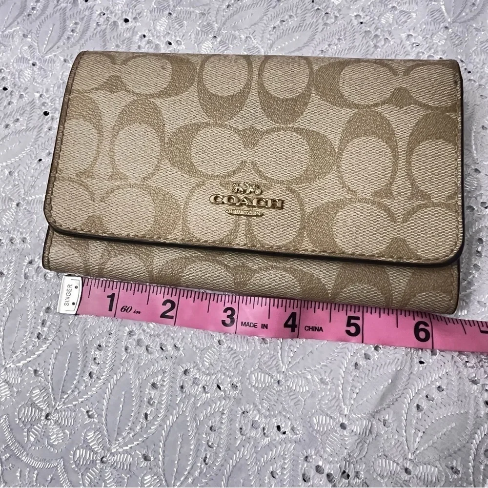 FLAP WALLET IN SIGNATURE CANVAS (COACH F32484)